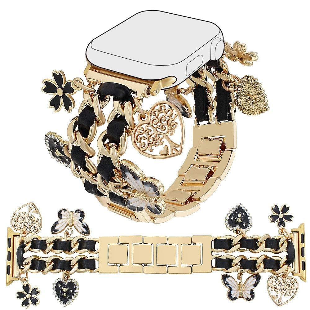 EIDERWOOD Apple Watch (38 / 40 / SE / 41 / 42mm) Metall Rem m. Kunstskinn & Vedheng - Gull / Svart