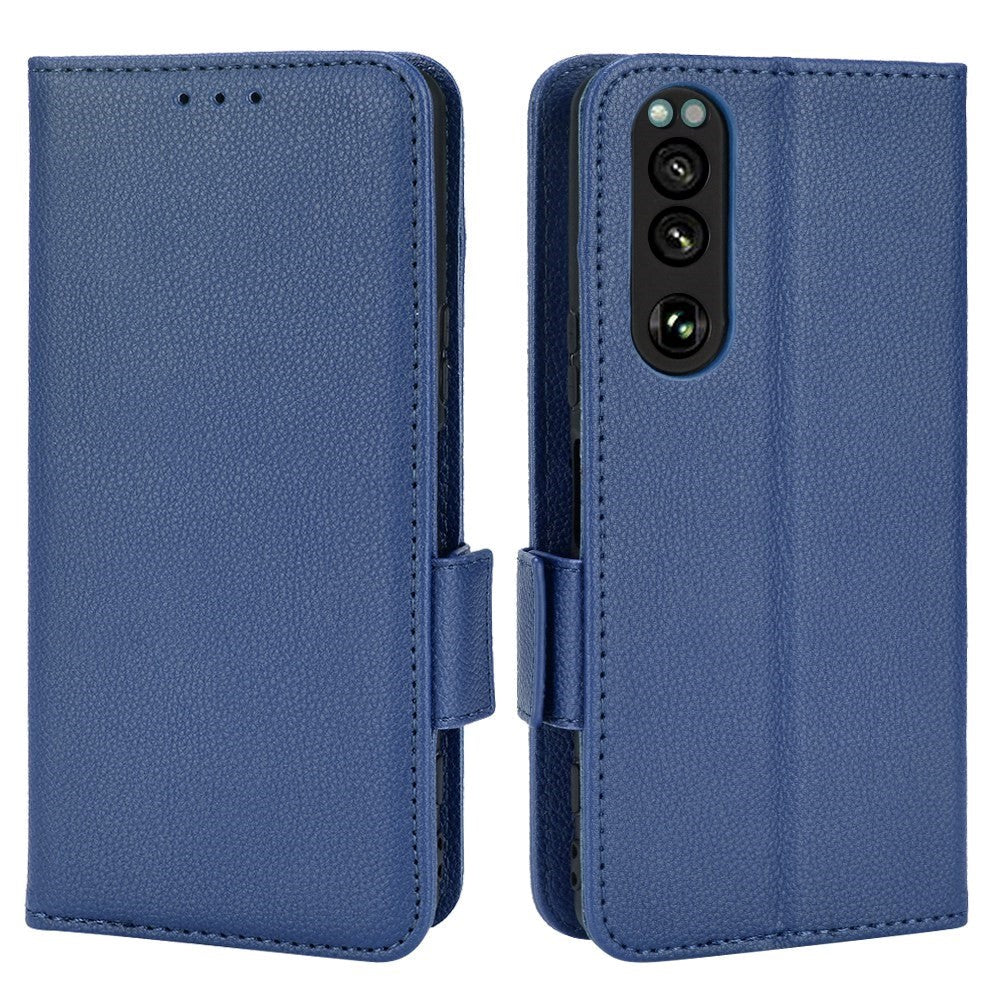 Sony Xperia 5 IV PU Litchi Skin Flip Deksel med Lommebok - Mørkblå