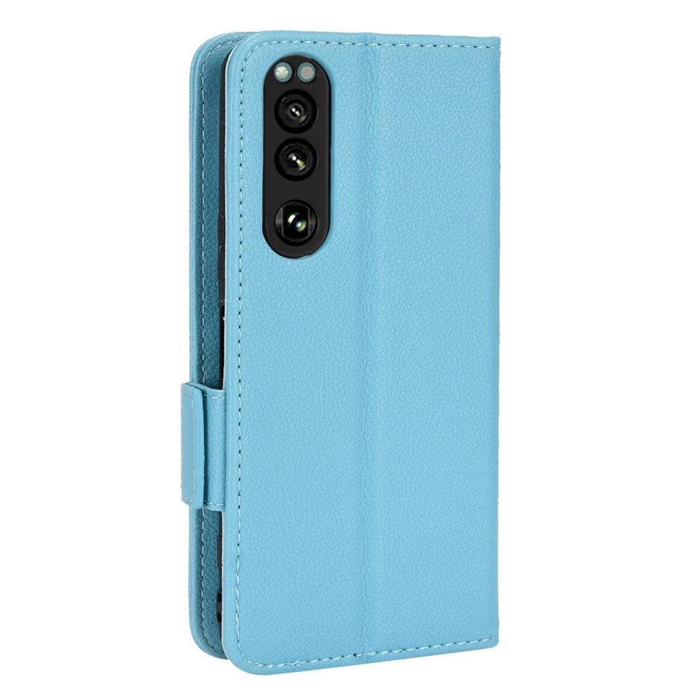 Sony Xperia 5 IV PU Litchi Skin Flip Deksel med Lommebok - Blå