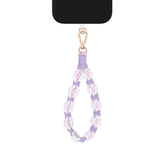 iDeal of Sweden Cord Wristlet Rem - Lilla Blomster